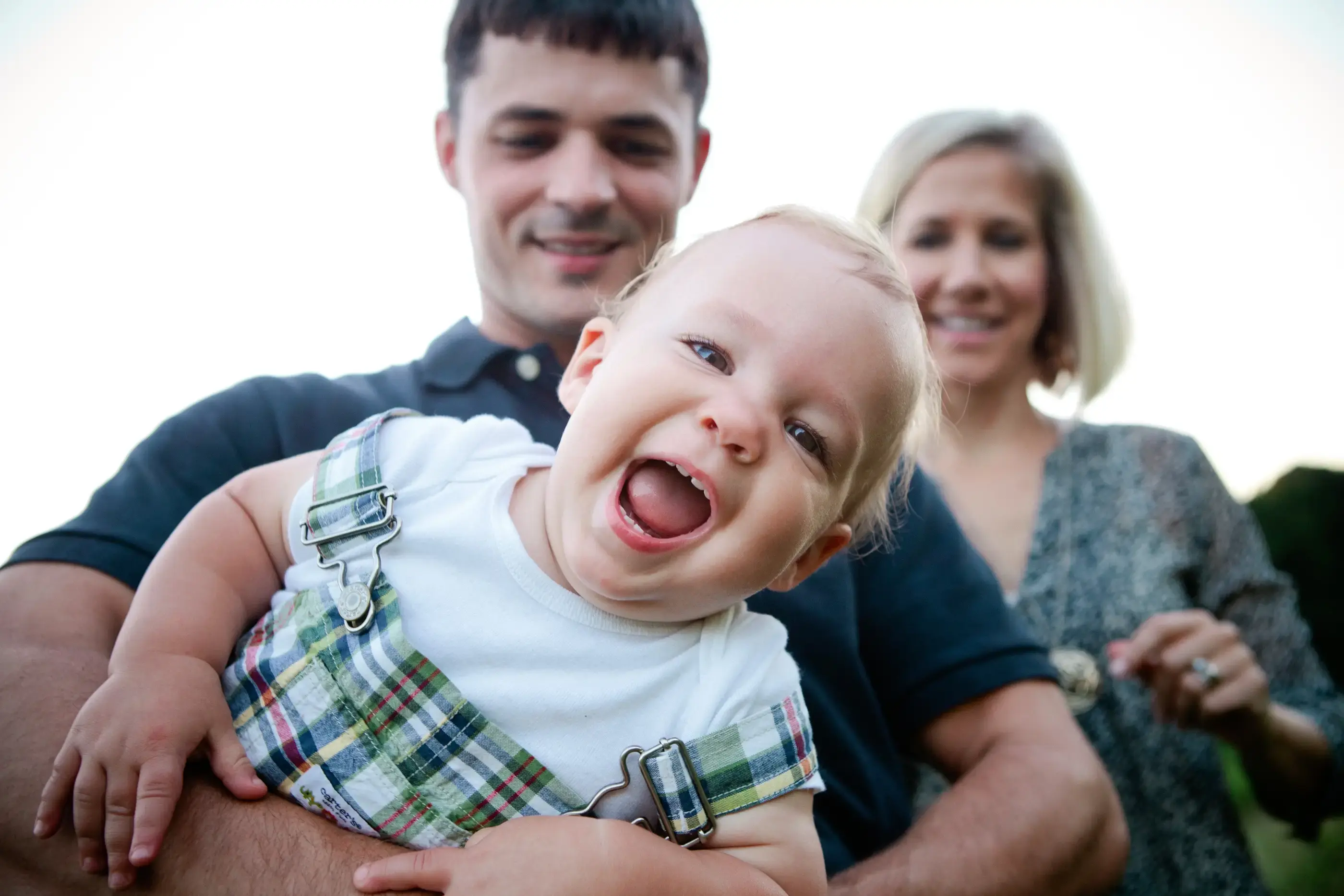 couple with happy baby